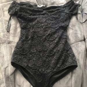Francesca’s black off the shoulder body suit